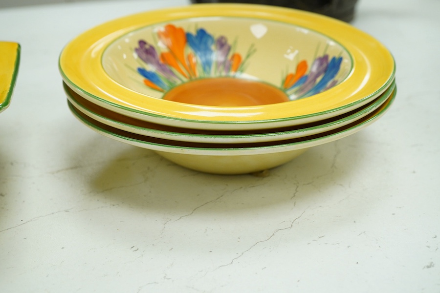 A Clarice Cliff Crocus pattern octagonal bowl and set of six dishes, largest 23cm wide. Condition - good